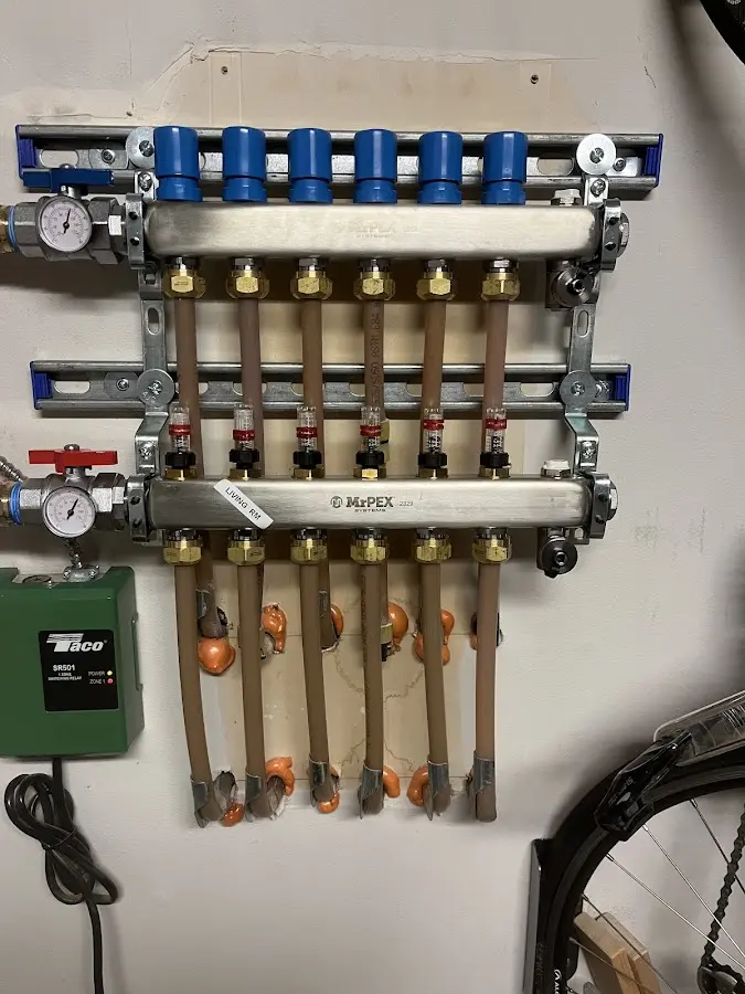 Plumber performing Leak Detection at a residential property in Houghton